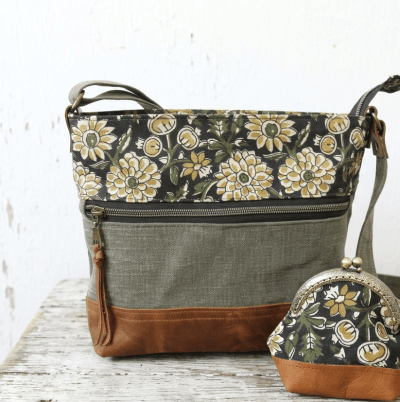 Sac en bandoulière pour femme avec fermerure zip en toile et cuir